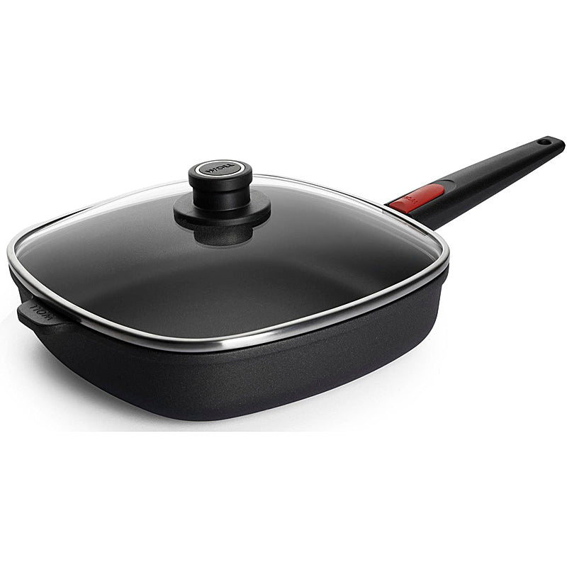 Woll Nowo-Titanium induction set consisting of a flat pan, 6.5cm high, 
26x26cm, removable handle, incl.
 matching safety glass lid in
 attractive gift box 1626ILL